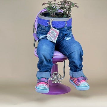 DUDETTE SITTING ON CHAIR